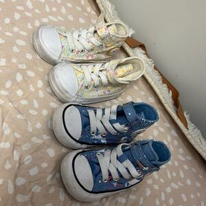 Two pairs of size 4 hi top converse